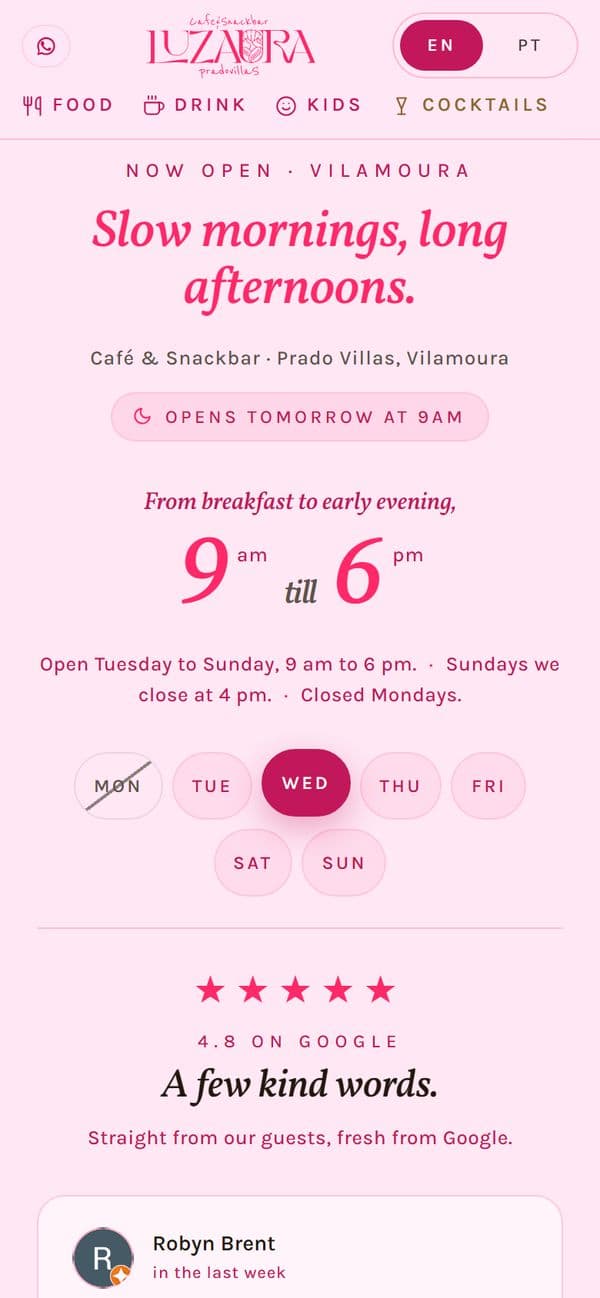 The Luz Aura Café website on a phone.