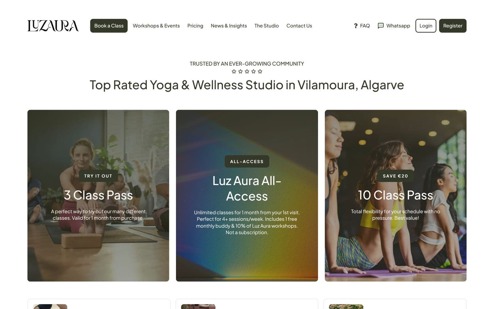 The Luz Aura Yoga website on a laptop: class passes with photos of classes.